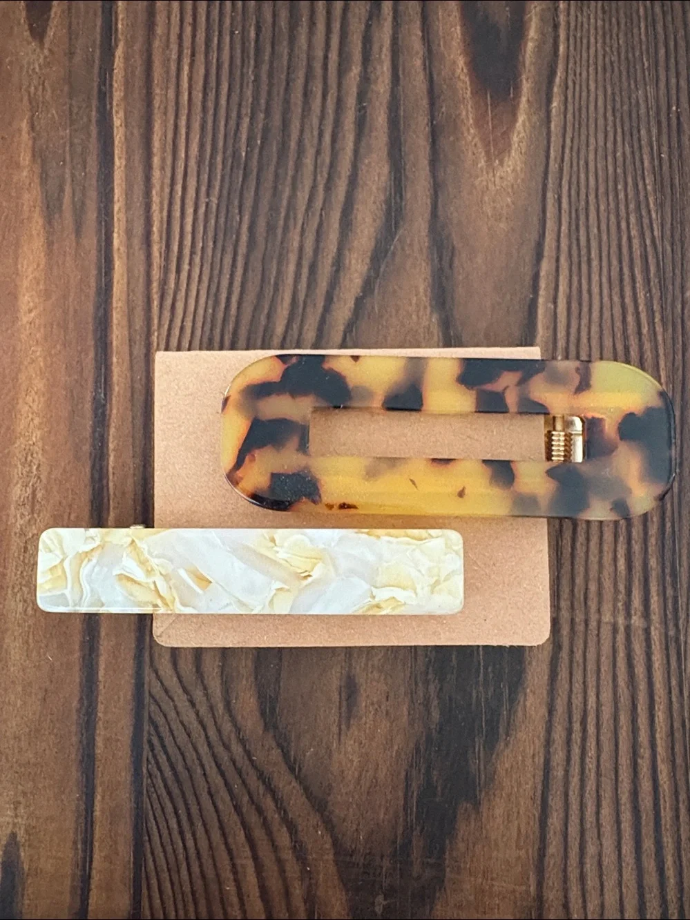 2 tortoise and pearl swirl hair clips